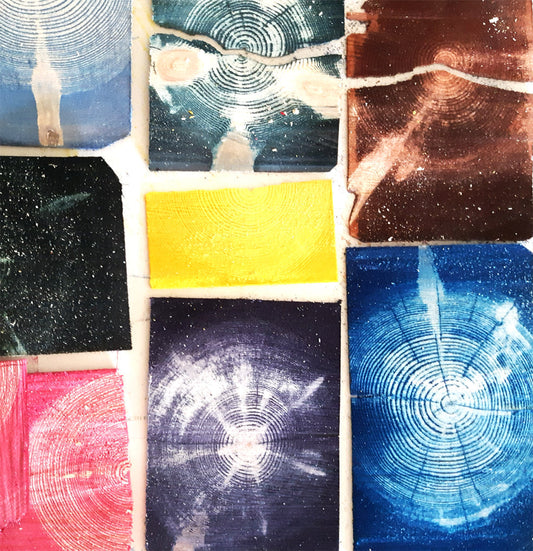 Colorful pieces of wood on a surface.